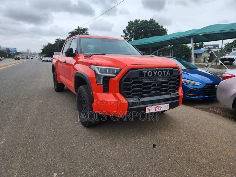 Toyota Tundra Platinum CrewMax 5.5' Bed Orange - Image 1